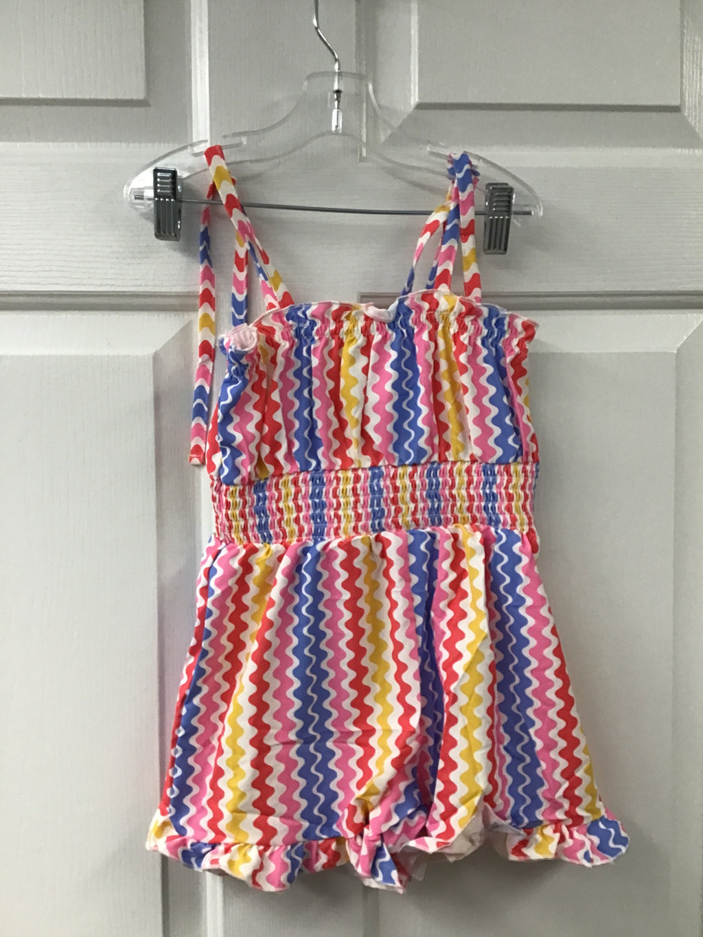 Summer Zings Smock RomperGirls’ Zigzag Smocked Summer Romper – Colorful Sleeveless One-Piece with Ruffle Legs & Elastic Bodice
