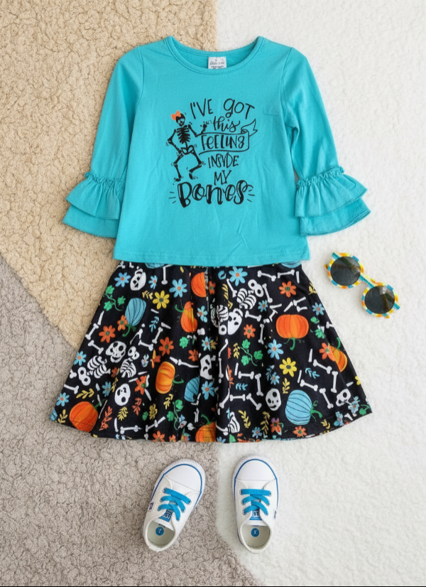 Girls Halloween Skeleton Outfit – “Feeling Inside My Bones” Ruffle Top & Printed Pants Set