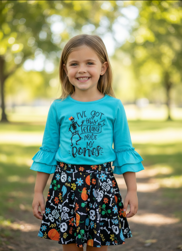 Girls Halloween Skeleton Outfit – “Feeling Inside My Bones” Ruffle Top & Printed Pants Set