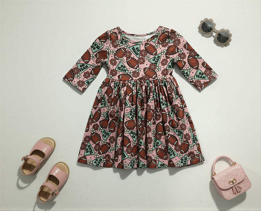 Girls’ “Go Team” Football Twirl Dress – Long Sleeve Pink Game Day Outfit with Pockets & Floral Print