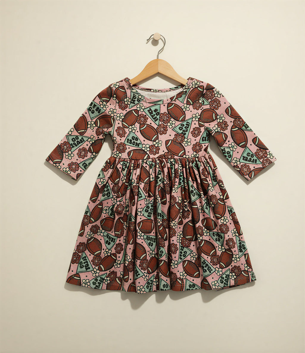Girls’ “Go Team” Football Twirl Dress – Long Sleeve Pink Game Day Outfit with Pockets & Floral Print