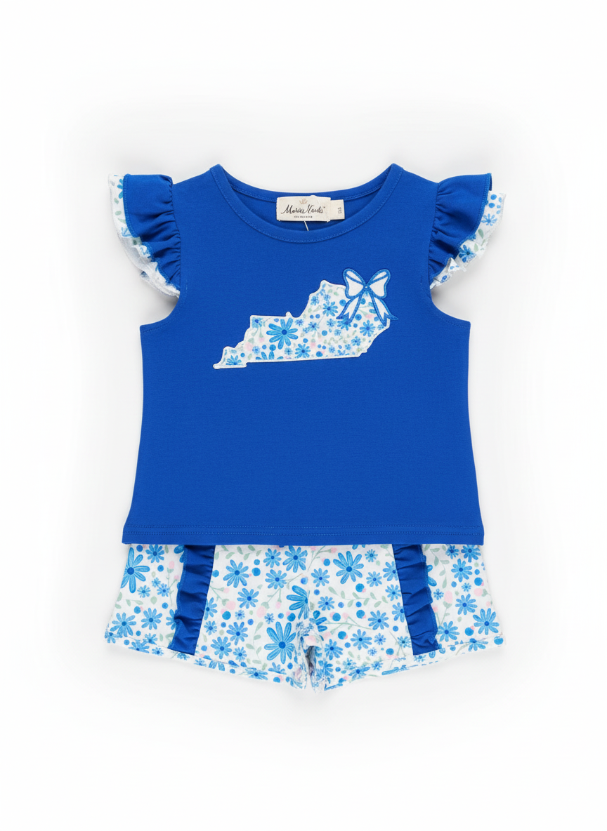 Blue top and shorts set with floral design on a textured surface