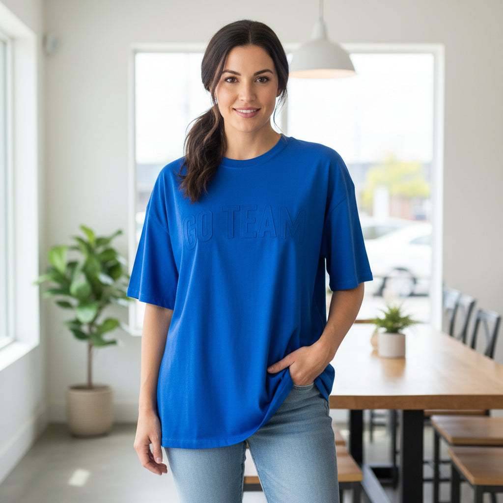 Embossed “GO TEAM” Blue T-Shirt – Bold Sports Graphic Tee for Game Day & Team Spirit
